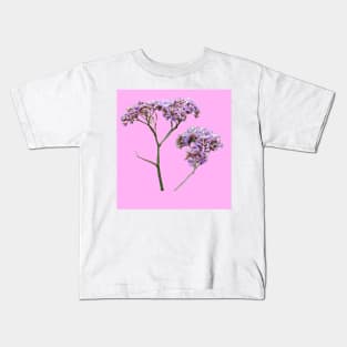 Purple flowers with a baby pink background Kids T-Shirt